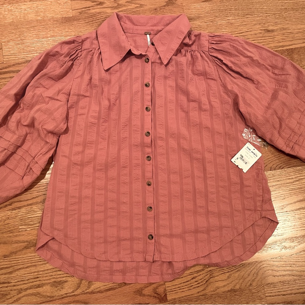 Free People. NWT. Top. Size L.  Color is Clay Rose